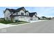 Exterior shot of newly built home shows modern farmhouse design with multiple garages at 4171 Barrel Ln, Westfield, IN 46062
