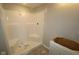 Modern bathroom features a new shower with gray accent tiles ready for finishing touches at 4181 Barrel Ln, Westfield, IN 46062