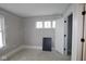 Bedroom with closet and three horizontal windows offering ample natural light at 4181 Barrel Ln, Westfield, IN 46062