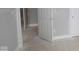 Hallway with white trim, doors, and neutral paint, ready for personalization at 4181 Barrel Ln, Westfield, IN 46062