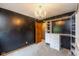 Charming bedroom with a chandelier, white closet, and a view of the doorway creating a comfortable and bright space at 4287 Gibbs Rd, Danville, IN 46122