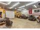 Spacious garage interior features a car lift, work area, and ample storage, perfect for automotive or hobby enthusiasts at 4287 Gibbs Rd, Danville, IN 46122