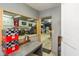 Office area with a view into the garage, providing a workspace integrated with garage activities and projects at 4287 Gibbs Rd, Danville, IN 46122