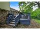 This home features a back deck with stairs, ideal for outdoor living and entertaining at 4570 Moccosin Pl, Greenwood, IN 46142