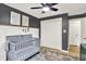Well-lit Bedroom with crib and storage at 4570 Moccosin Pl, Greenwood, IN 46142