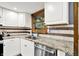 Functional kitchen featuring granite countertops, stainless steel appliances, and ample cabinet space at 4570 Moccosin Pl, Greenwood, IN 46142