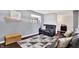 Comfortable living room with modern decor and a cozy seating arrangement at 4570 Moccosin Pl, Greenwood, IN 46142