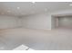 Expansive basement featuring recessed lighting and carpeted floor, ideal for recreational activities and relaxation at 4617 S Cobblestone Dr, Zionsville, IN 46077