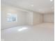 Spacious carpeted basement with recessed lighting and a large window for natural light at 4617 S Cobblestone Dr, Zionsville, IN 46077