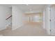 Spacious carpeted basement featuring recessed lighting and natural light from window and open door at 4617 S Cobblestone Dr, Zionsville, IN 46077