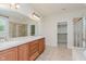 Bathroom features a double sink vanity, large mirror, and separate shower and tub at 4617 S Cobblestone Dr, Zionsville, IN 46077