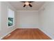 Neutral bedroom with hardwood floors and a ceiling fan at 4617 S Cobblestone Dr, Zionsville, IN 46077
