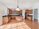 Spacious kitchen featuring wood cabinets, granite countertops and stainless appliances at 4617 S Cobblestone Dr, Zionsville, IN 46077
