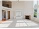 Light-filled living room with fireplace and open concept design at 4617 S Cobblestone Dr, Zionsville, IN 46077
