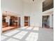 Open-concept living area with view to kitchen with abundant natural light at 4617 S Cobblestone Dr, Zionsville, IN 46077
