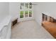 Bright living room from above featuring a fireplace, built-ins, and large windows at 4617 S Cobblestone Dr, Zionsville, IN 46077