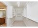 Bright walk-in closet featuring built-in shelving and ample storage space at 4617 S Cobblestone Dr, Zionsville, IN 46077