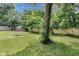 Backyard features wooden fence, chain link fence and a fire pit at 4708 Haverford Ave, Indianapolis, IN 46205