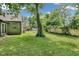 Backyard featuring well kept lawn and wooden fence at 4708 Haverford Ave, Indianapolis, IN 46205