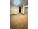 Bedroom featuring a carpeted floor, neutral walls, and a closet with mirrored doors at 4708 Haverford Ave, Indianapolis, IN 46205