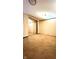 Cozy bedroom offers a carpeted floor, painted brick walls, and mirrored closet doors at 4708 Haverford Ave, Indianapolis, IN 46205