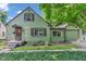 Charming home with a traditional design, featuring a well-maintained lawn and classic architectural details at 4708 Haverford Ave, Indianapolis, IN 46205