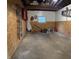Spacious garage featuring pegboard walls, a small window, and ample storage capacity at 4708 Haverford Ave, Indianapolis, IN 46205