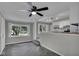 Open concept kitchen with stainless steel appliances and a breakfast bar, connecting to the dining area at 4708 Haverford Ave, Indianapolis, IN 46205