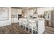 Bright, modern kitchen with granite countertops and stainless steel appliances at 4882 Morning Valley Ct, McCordsville, IN 46055