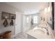 Bright bathroom featuring double sink vanity, modern fixtures, and walk-in shower for a spa-like experience at 4992 Fennel Dr, Pittsboro, IN 46167