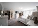 Spacious bedroom with neutral tones, plush carpet, abundant natural light, and organized storage solutions at 4992 Fennel Dr, Pittsboro, IN 46167