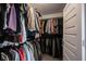 Walk-in closet with organized hanging space for clothing and accessories, providing ample storage at 4992 Fennel Dr, Pittsboro, IN 46167