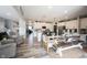 Spacious, open-concept kitchen featuring a large island with seating, stainless steel appliances, and modern finishes at 4992 Fennel Dr, Pittsboro, IN 46167