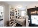 Bright landing area featuring stylish decor, built-in bookcase, and providing a comfortable transition between floors at 4992 Fennel Dr, Pittsboro, IN 46167