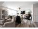 Open-concept living room with a large sectional sofa, comfortable seating, and modern decor at 4992 Fennel Dr, Pittsboro, IN 46167