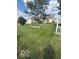 Backyard featuring a huge, well-manicured lawn at 5304 Appleseed Way, Indianapolis, IN 46217