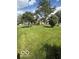 Backyard featuring a huge, well-manicured lawn at 5304 Appleseed Way, Indianapolis, IN 46217