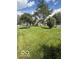 Home featuring a huge, well-manicured lawn at 5304 Appleseed Way, Indianapolis, IN 46217