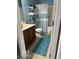 Clean and functional bathroom with a shower/tub and storage shelves at 5304 Appleseed Way, Indianapolis, IN 46217