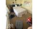 Comfortable bedroom with carpet flooring, a double bed and plenty of natural light at 5304 Appleseed Way, Indianapolis, IN 46217