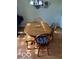 Inviting dining room with hardwood floors, wood table and wooden chairs at 5304 Appleseed Way, Indianapolis, IN 46217