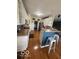 Charming kitchen boasts updated cabinets, counters, stainless appliances, and breakfast bar seating at 5304 Appleseed Way, Indianapolis, IN 46217