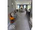Spacious living area featuring neutral carpeting and a bench at 5304 Appleseed Way, Indianapolis, IN 46217