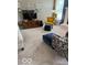 Cozy living room featuring neutral carpeting, a TV, and a fireplace at 5304 Appleseed Way, Indianapolis, IN 46217