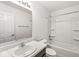 A bathroom featuring a shower-tub combo, a toilet, and a vanity with a marble countertop at 5409 Brandywine Dr, Whitestown, IN 46075