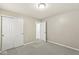 Comfortable bedroom with plush carpet, double door closet and natural light at 5409 Brandywine Dr, Whitestown, IN 46075