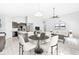Open-concept living space showcases a dining area that seamlessly integrates the kitchen with a bright and welcoming layout at 5409 Brandywine Dr, Whitestown, IN 46075
