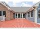 Beautiful back deck overlooking the expansive yard with blue siding and red painted deck at 5695 N Red Oak Dr, Greenfield, IN 46140