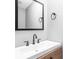 This bathroom features a vanity with under-cabinet storage, a modern sink, and a mirror at 5695 N Red Oak Dr, Greenfield, IN 46140