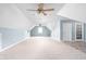 Large bonus room featuring carpet, a ceiling fan, and white trim at 5695 N Red Oak Dr, Greenfield, IN 46140